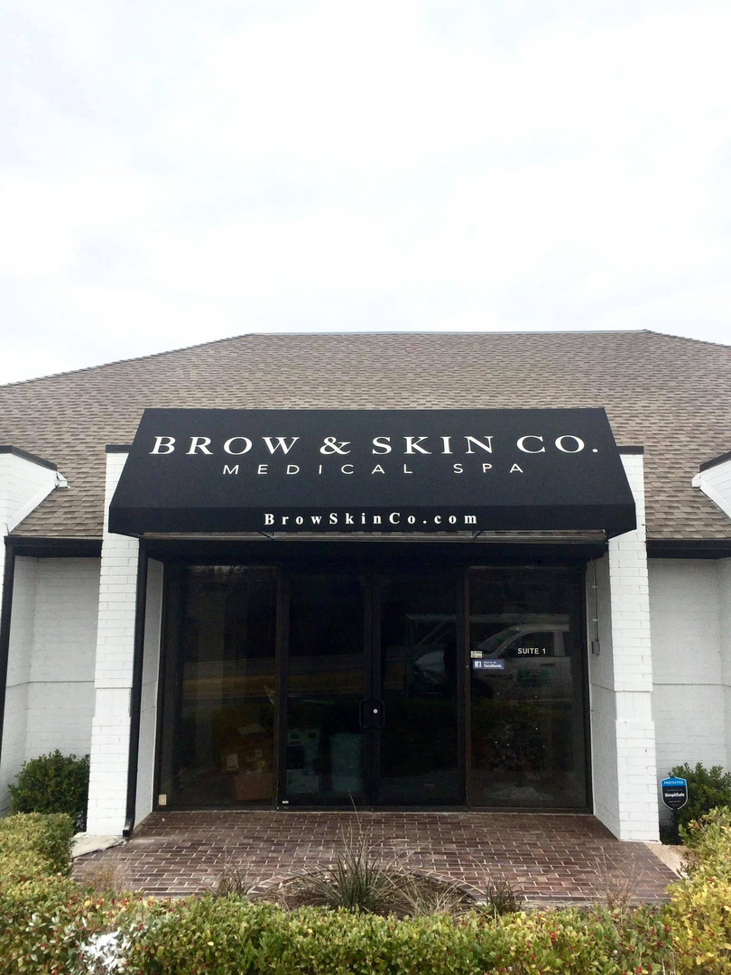 Custom retail awning installed by Scissortail Shade Company